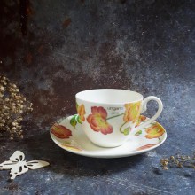 Set trà men bóng trang trí hoa của Ungaro Paris.